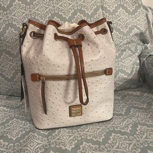 Drawstring Dooney and Bourke, brand new never used.